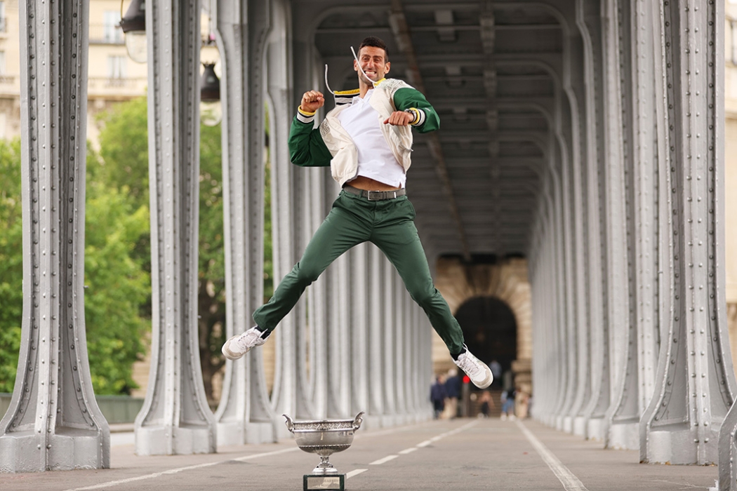 Novak Djokovic celebrates with his Roland Garros trophy