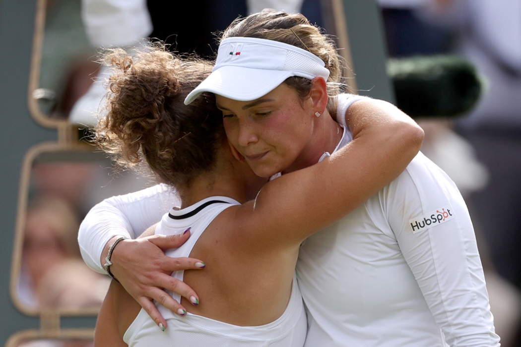 Donna Vekic hugs Jasmine Paolini after losing their epic Wimbledon semifinal